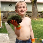 Ethan helps dad out with yard work.