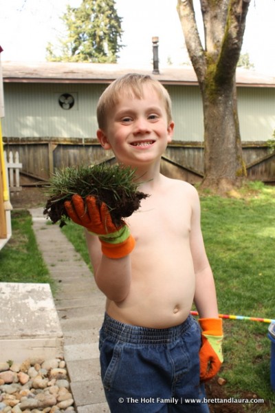 Ethan helps dad out with yard work.