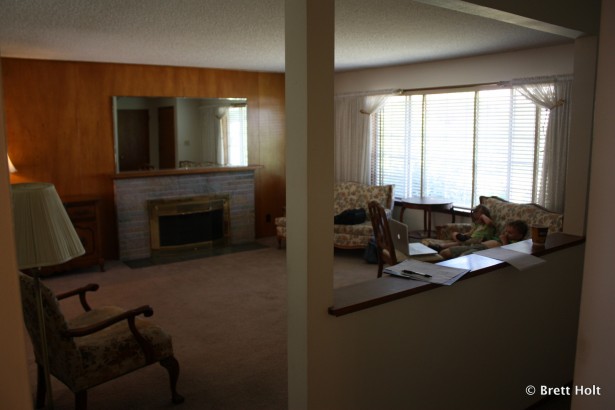 Family Room. Carpet is being pulled and wood floors underneath refinished by us.